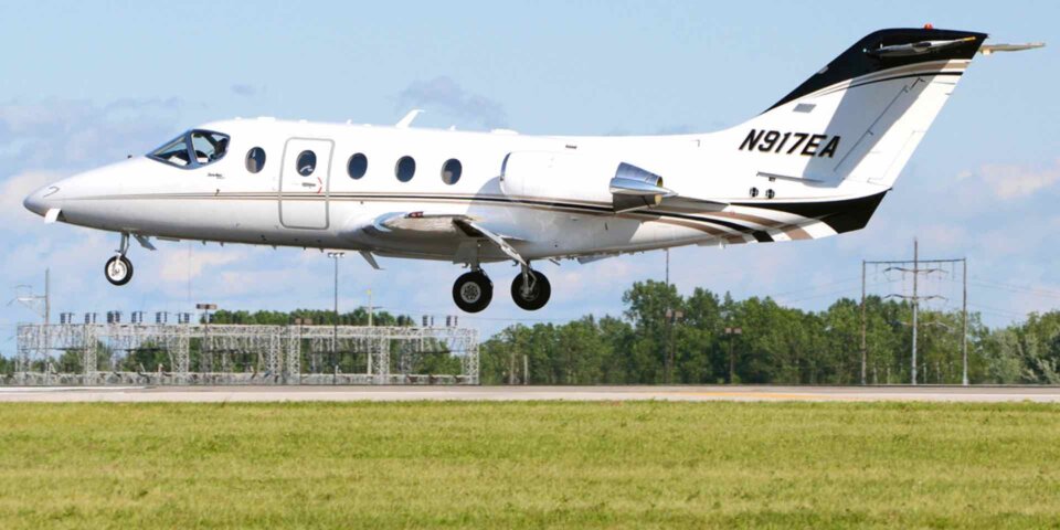 Beechcraft Beechjet taking off tail number N917EA